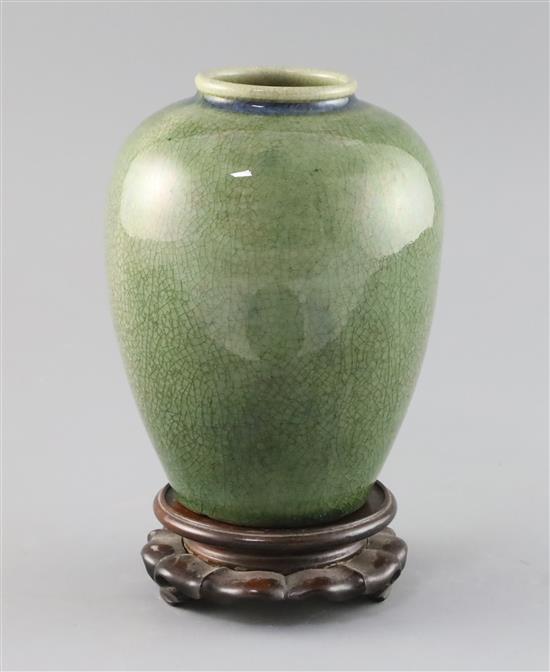 A Chinese green Jun-type vase, 19th century, H. 17cm, wood stand